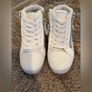 Dolce Vita sneakers never worn.  Size 8 1/2